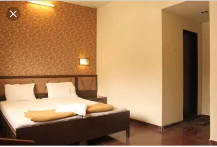 Hotel Ganesh Palace Мумбаи Экстерьер фото